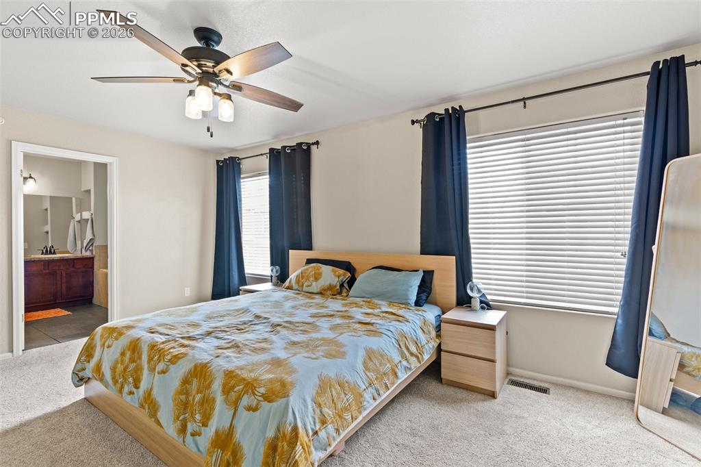 Image 18 of 31: Master Bedroom