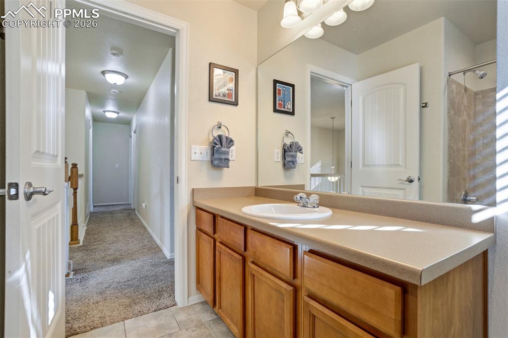 Image 30 of 50: Upper Level Bathroom