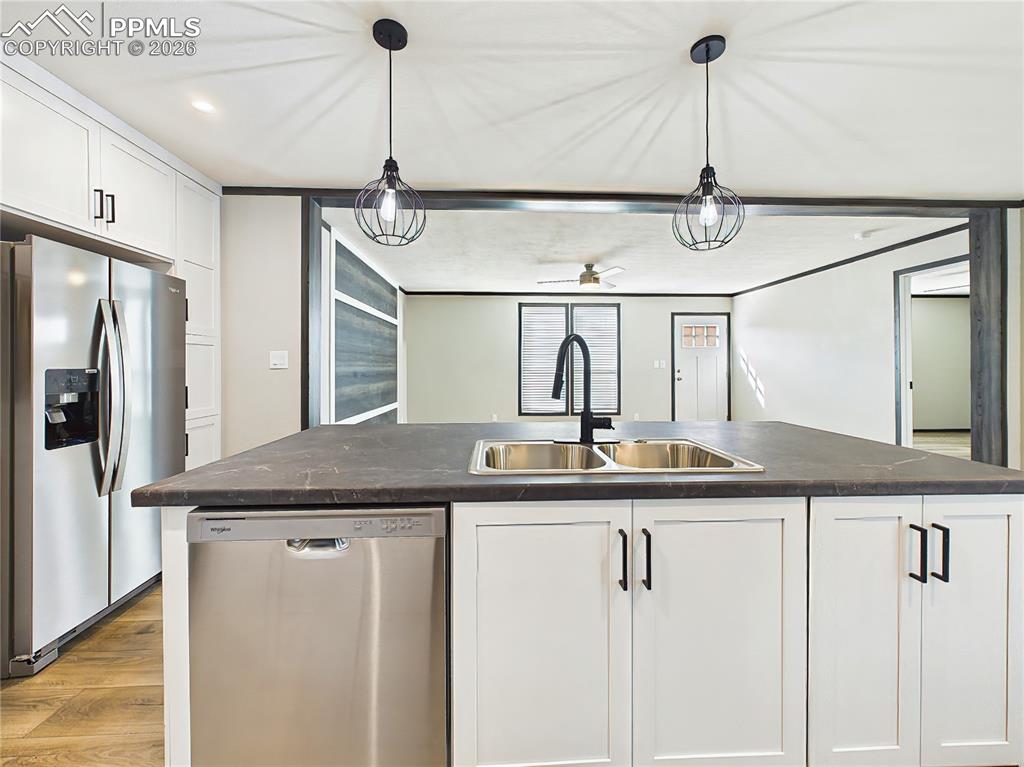 Image 22 of 50: Kitchen Island – Spacious island with dual-basin sink, ample prep space, an