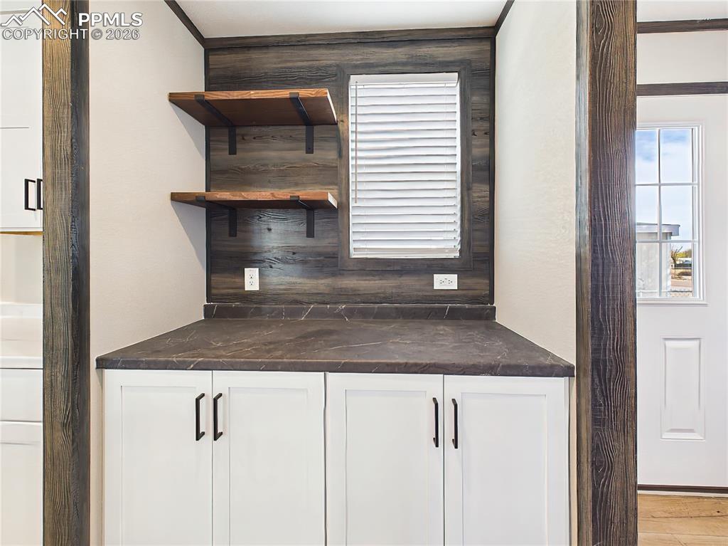 Image 25 of 50: Coffee Bar / Prep Area – Dedicated prep or coffee station with built-in cab