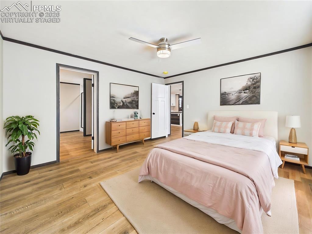 Image 29 of 50: (Virtually Staged) – Inviting bedroom with staged furnishings that illustra