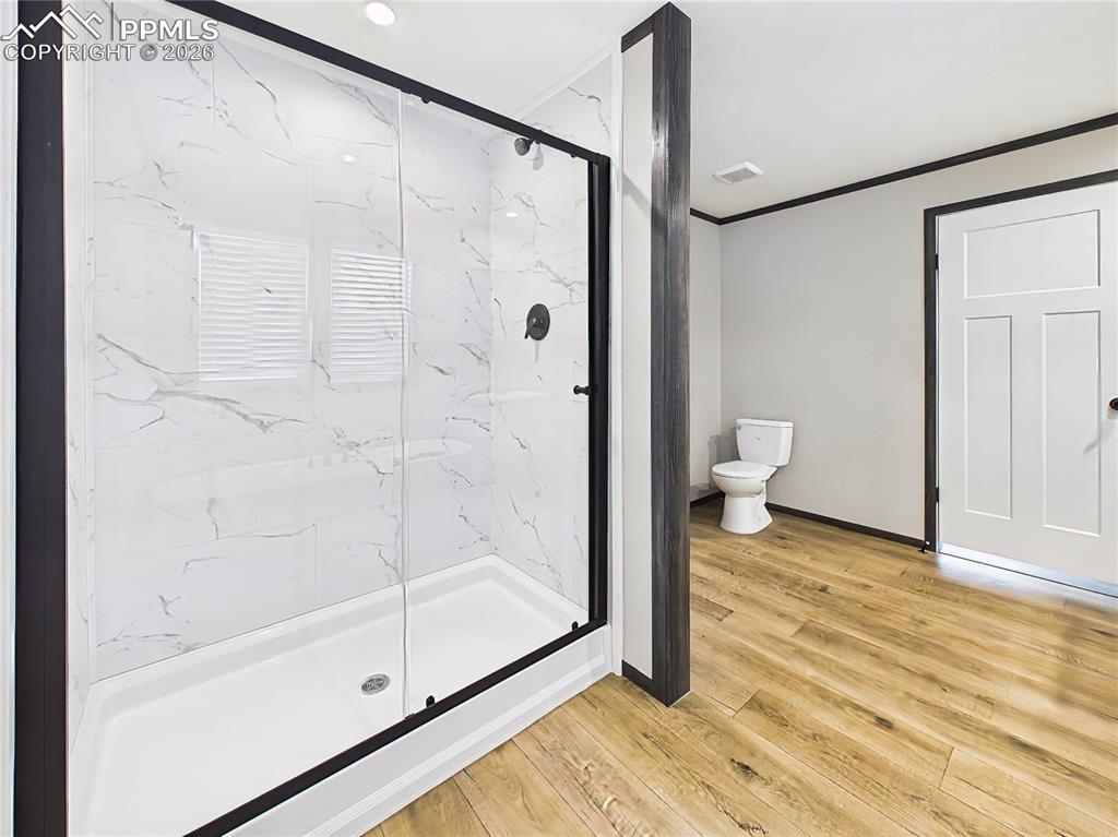 Image 32 of 50: Primary Bathroom (Shower) – Walk-in shower with contemporary tile surround