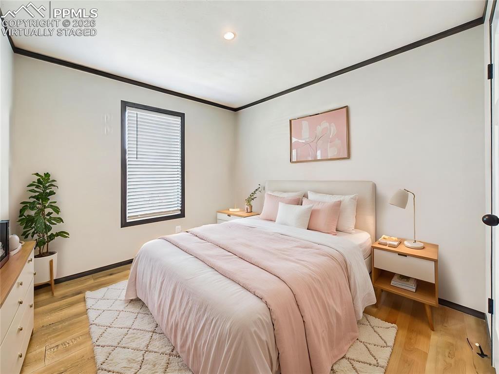 Image 39 of 50: (Virtually Staged) – Comfortable bedroom 3 layout showcasing space for a fu