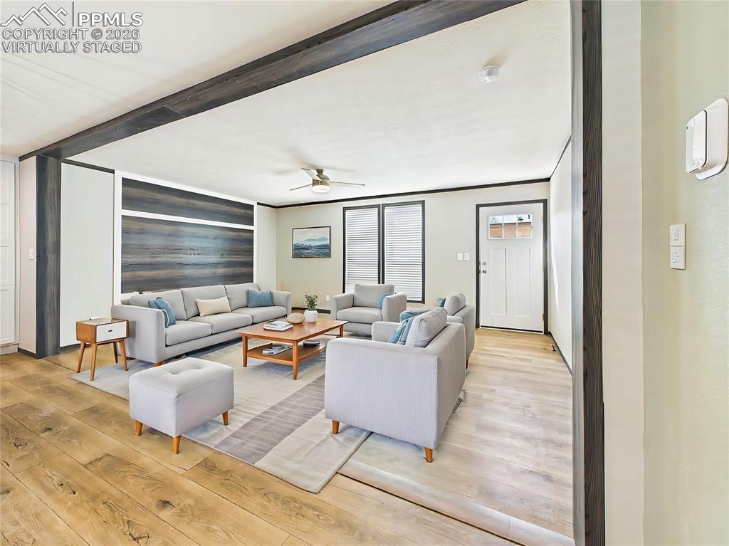 Image 4 of 50: (Virtually Staged) – Staged living space illustrating layout potential with