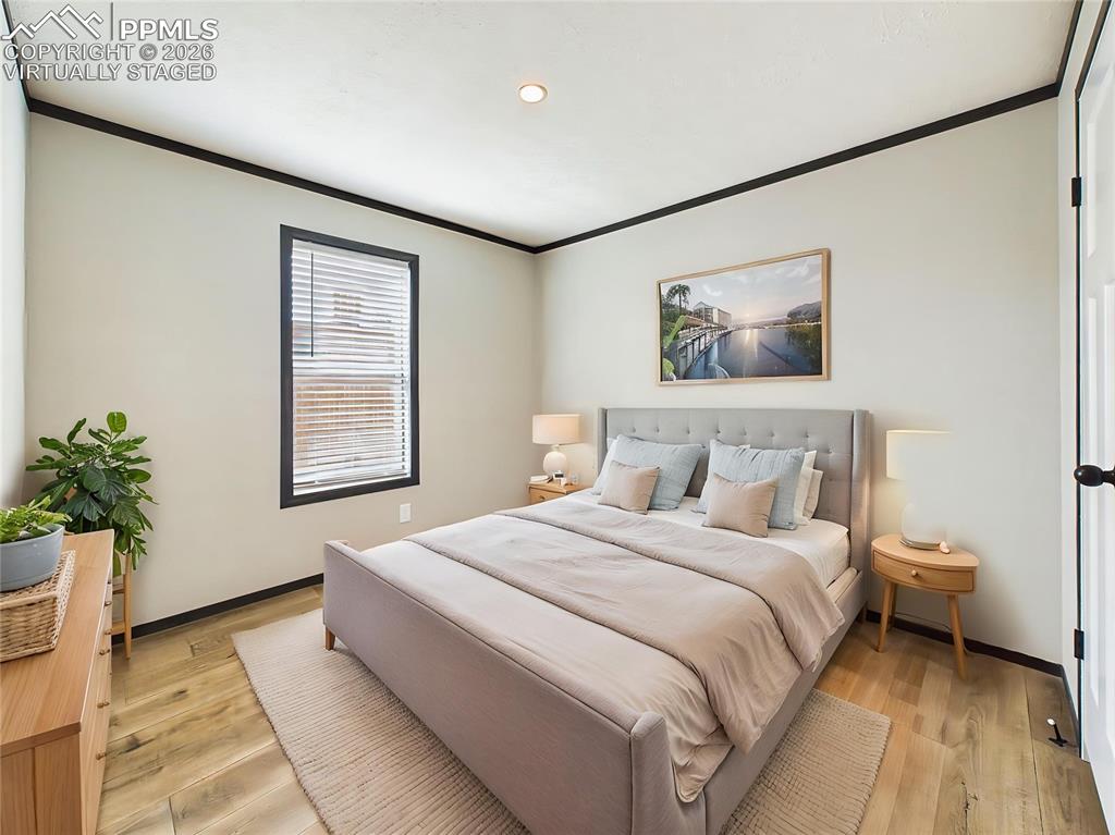 Image 41 of 50: (Virtually Staged) – Comfortable bedroom 4 layout showcasing space for a fu