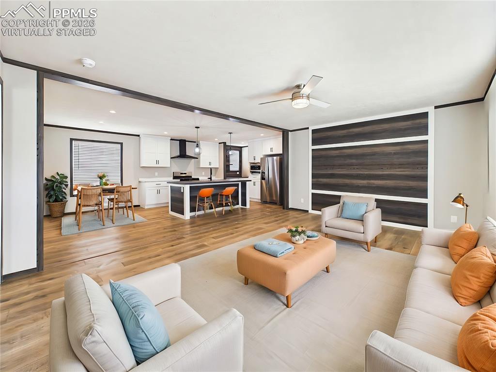 Image 6 of 50: (Virtually Staged) Open living space showcasing clean lines, Luxury Vinyl f