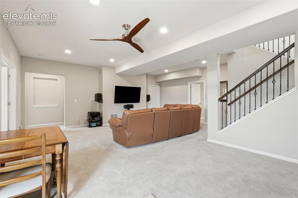 Image 33 of 47: Carpeted recreation room featuring recessed lighting and a contemporary cei