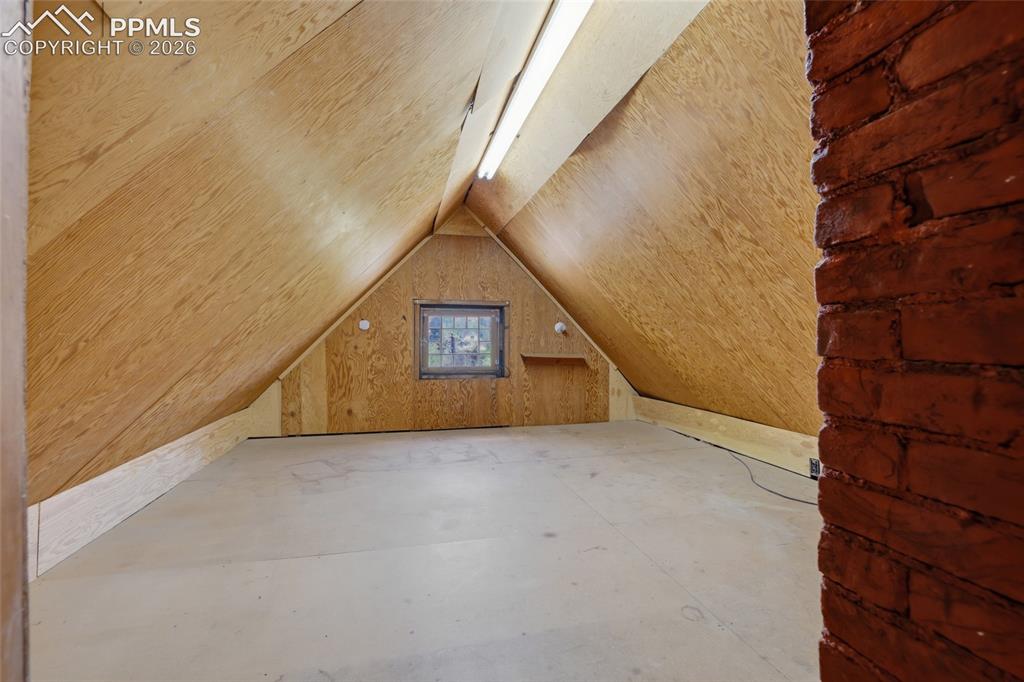 Image 29 of 44: Unfinished attic for lots of storage.