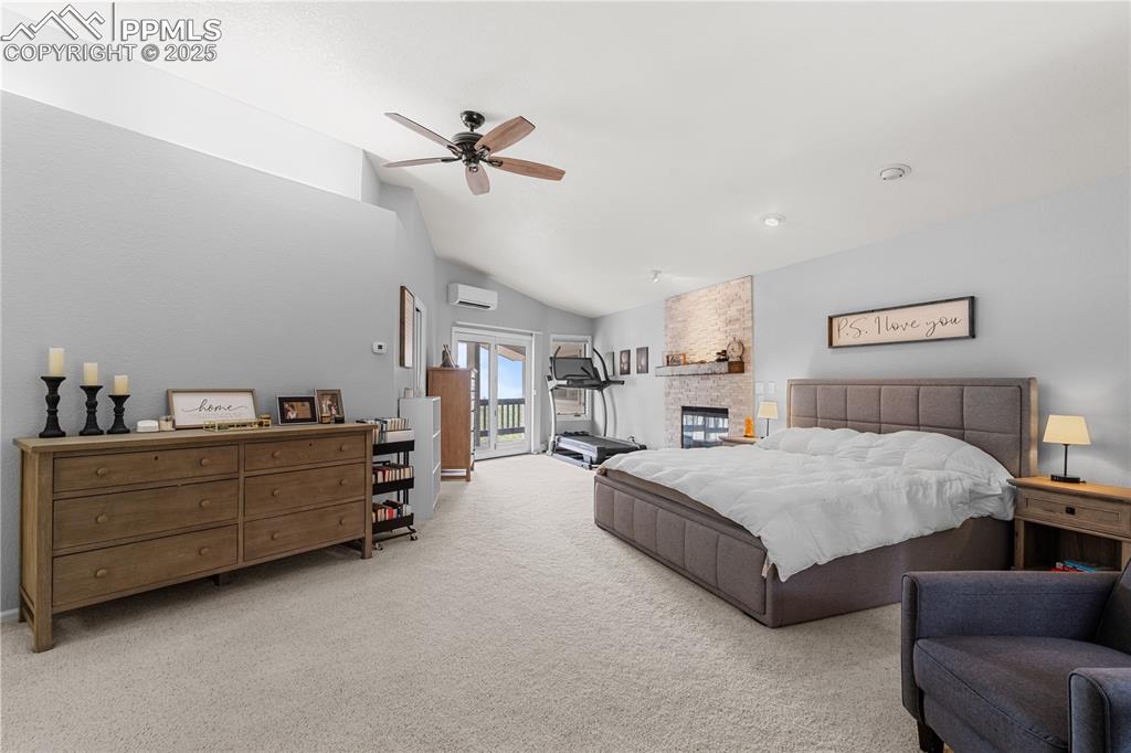 Image 28 of 47: The primary suite offers space and luxury with a private en-suite, fireplac