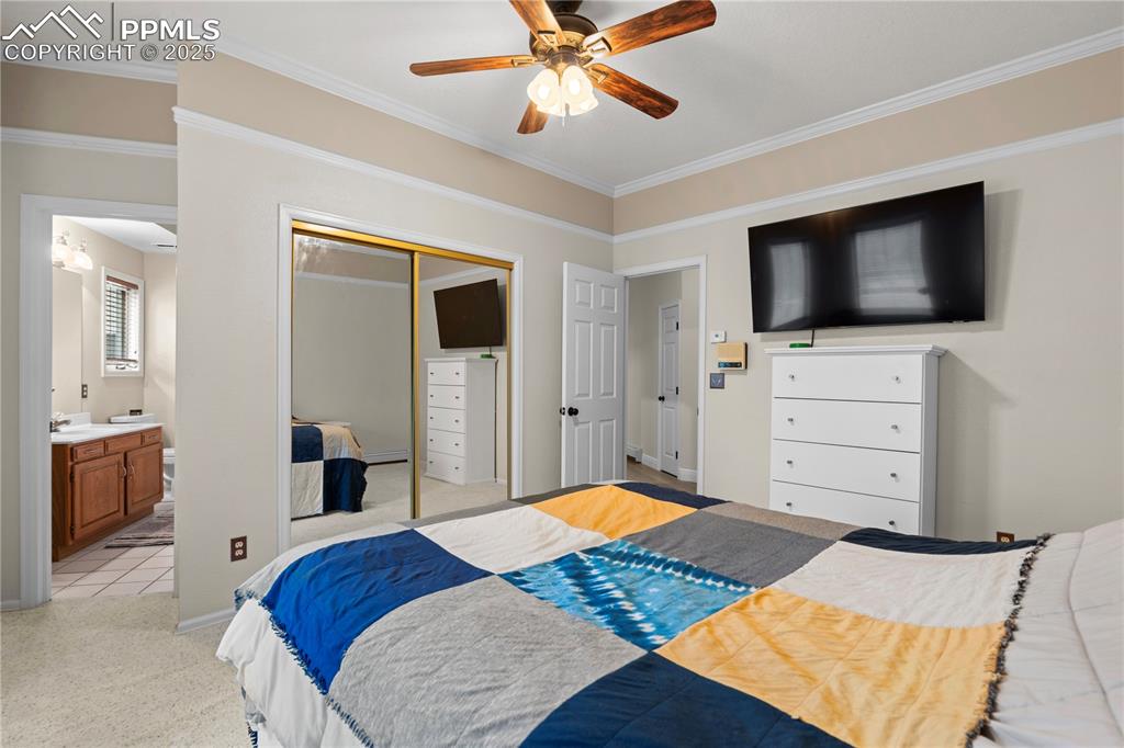 Image 31 of 47: Large bedroom with connected bathroom 