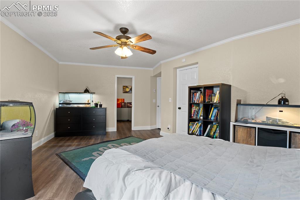 Image 37 of 47: Large bedroom with luxury floors
