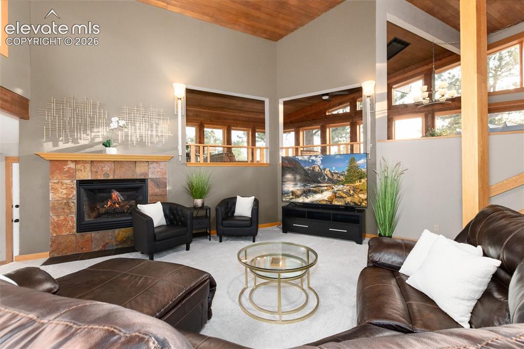 Image 14 of 50: Living room facing the Happy Place
