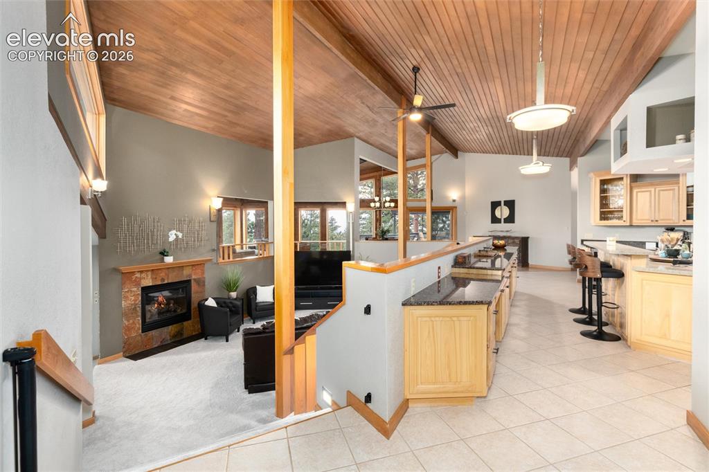 Image 6 of 50: Overlooking kitchen and living room