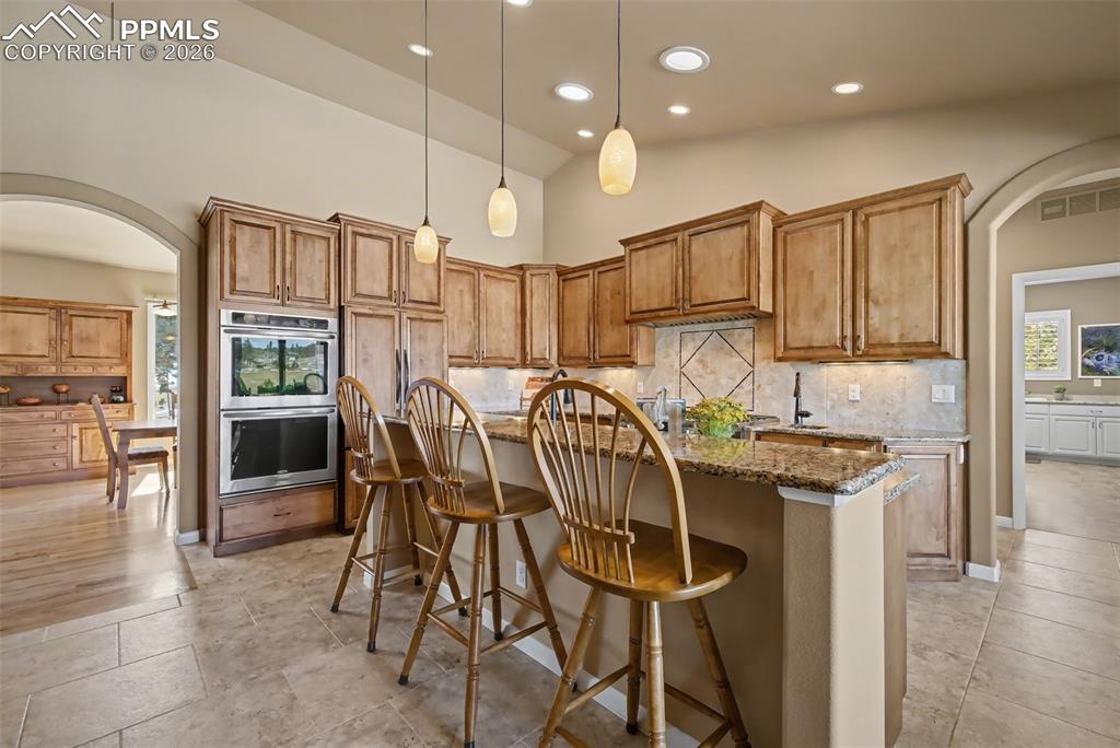 Image 13 of 45: Gourmet kitchen to include an 8 burner BlueStar gas cooktop