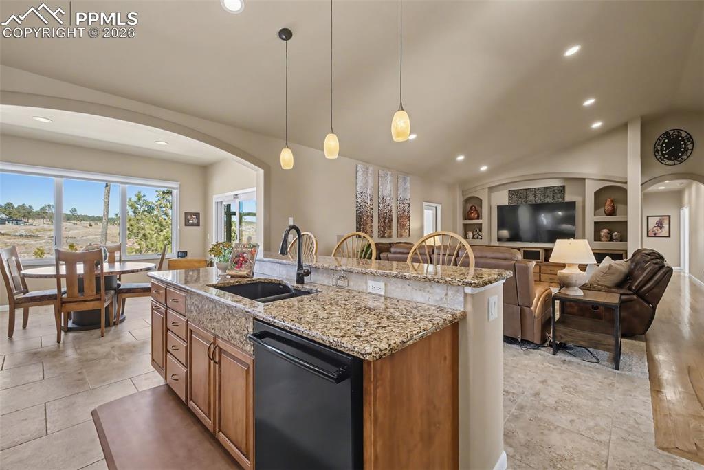 Image 15 of 45: Exquisite maple cabinetry throughout