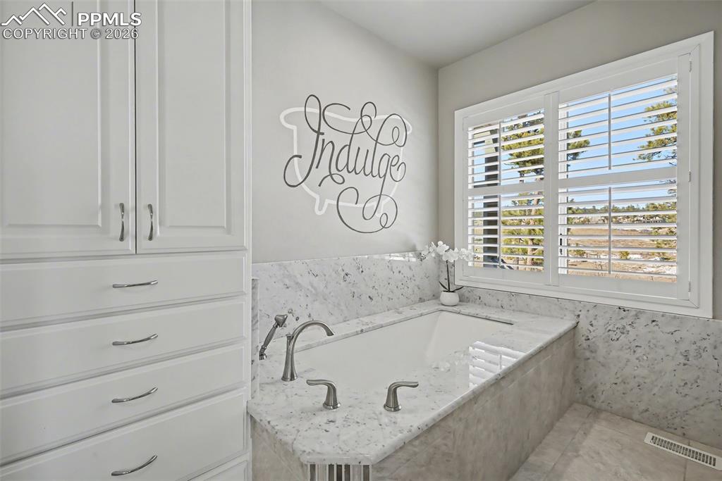 Image 30 of 45: 5 piece with in floor heat and HUGE walk-in closet