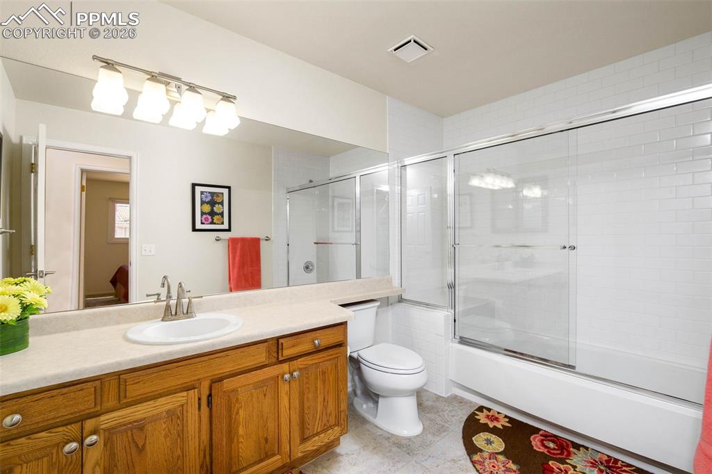 Image 26 of 31: Large full length east-facing deck