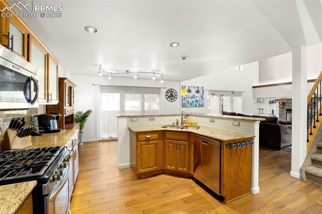 Image 9 of 31: Separate office space with french doors and west-facing window