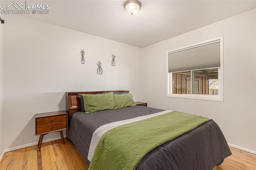 Image 11 of 28: Bedroom on main floor