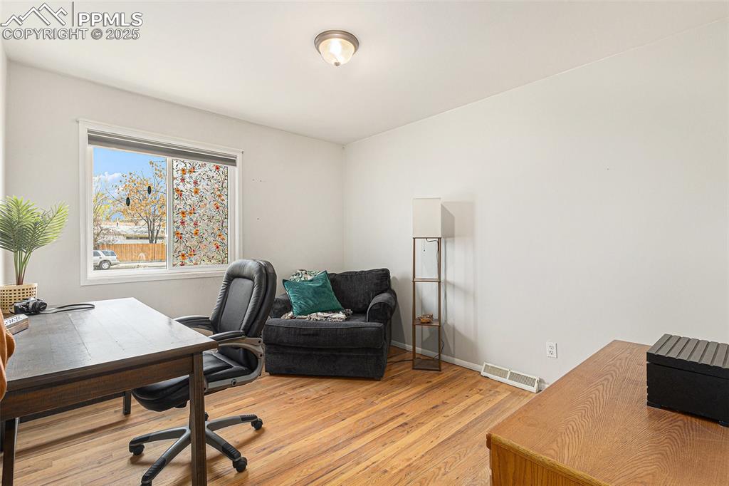 Image 12 of 28: Bedroom on main floor