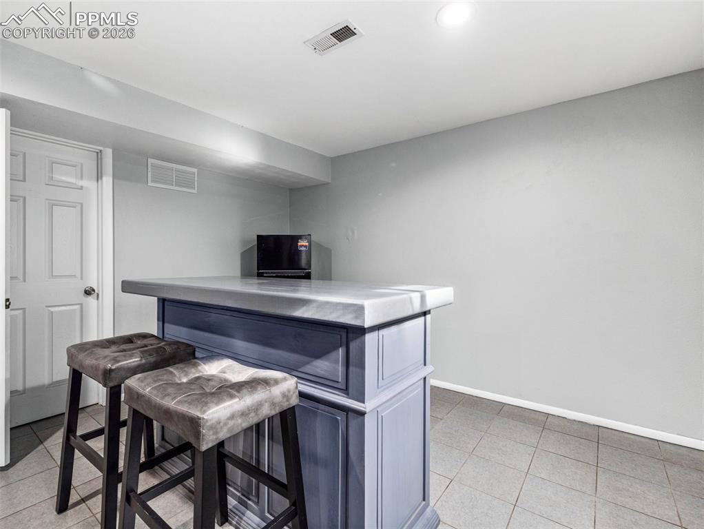 Image 20 of 31: Dry bar area 