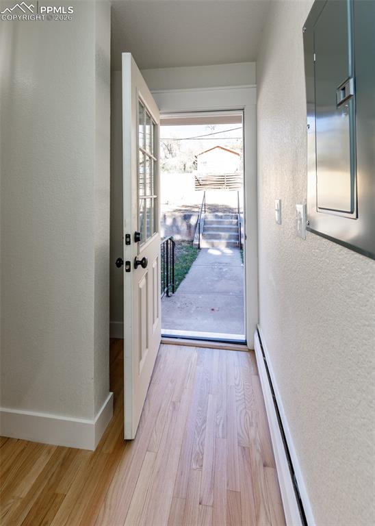 Image 17 of 50: Walk-out from kitchen to backyard