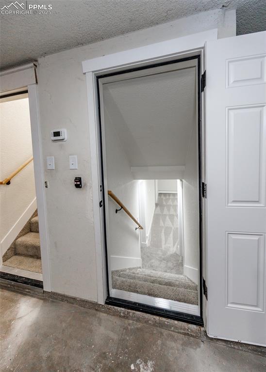 Image 37 of 50: Entry to the basement from garage 