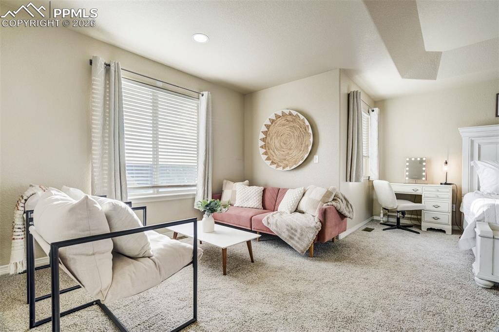 Image 29 of 49: Sitting area in the Primary Bedroom. 