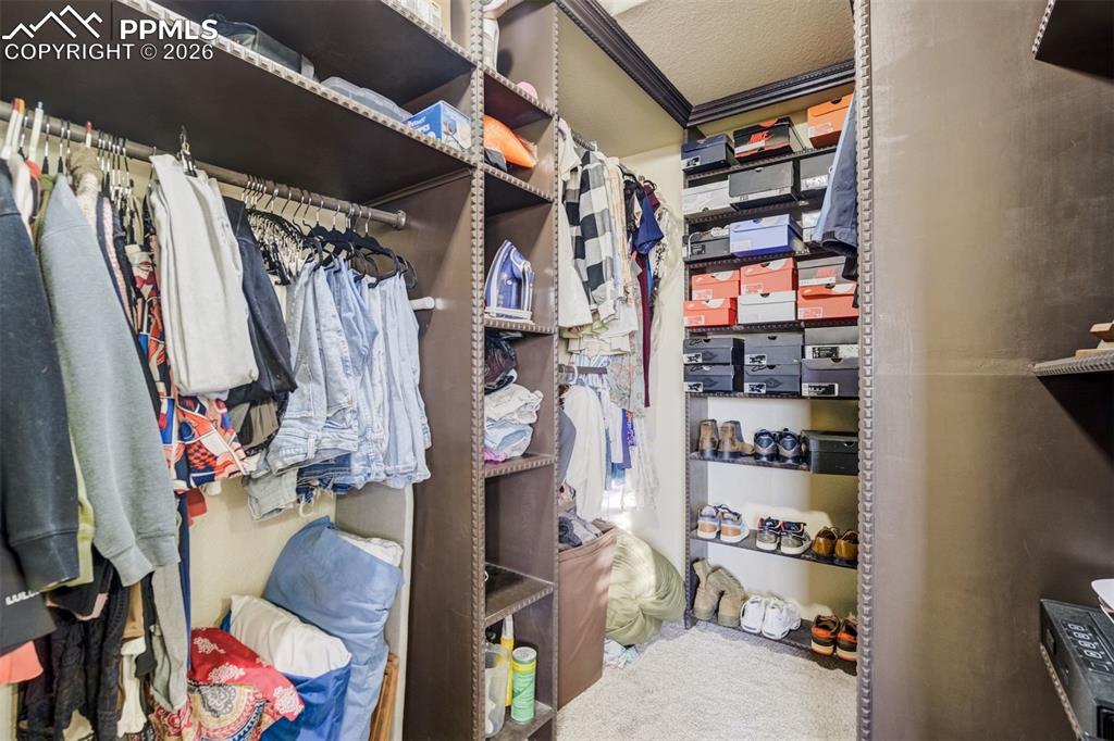 Image 34 of 49: Walk-in closet. 