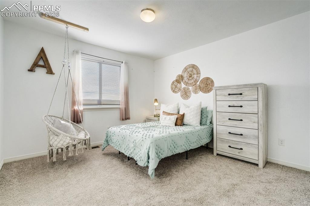 Image 35 of 49: Bedroom 2 upstairs. 