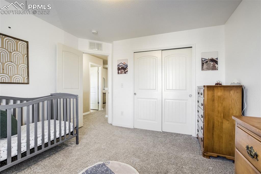 Image 37 of 49: Bedroom 3 upstairs. 
