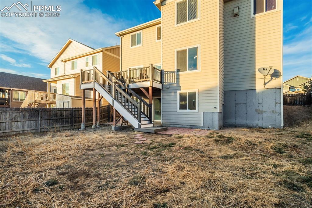 Image 45 of 49: Get your garden gloves- your backyard awaits! 