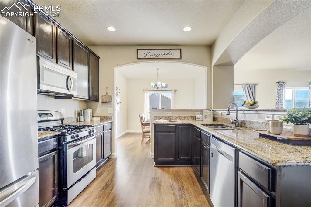 Image 9 of 49: A kitchen that supports your takeout and your cooking era.
