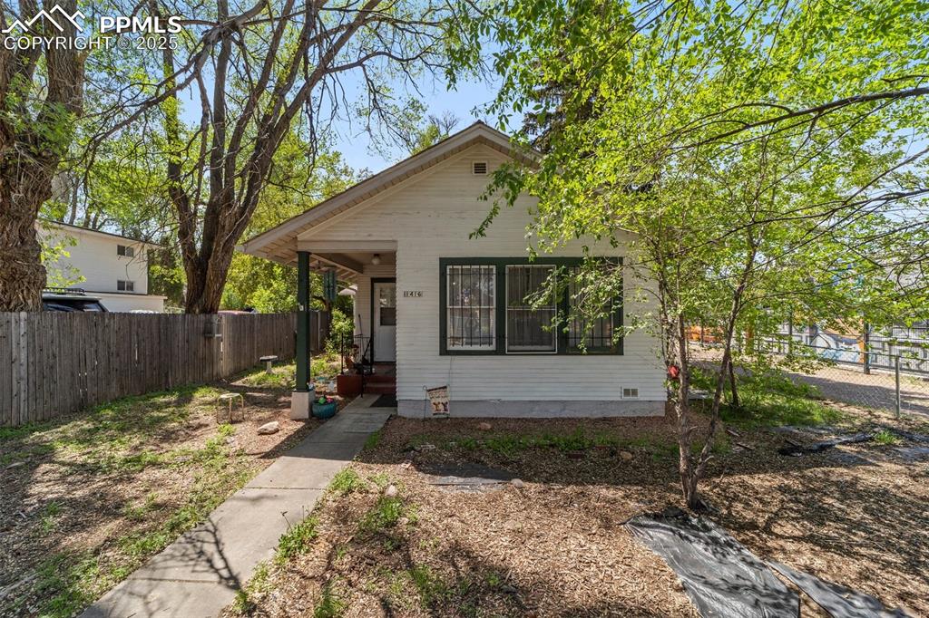 Image 18 of 31: View of front of home