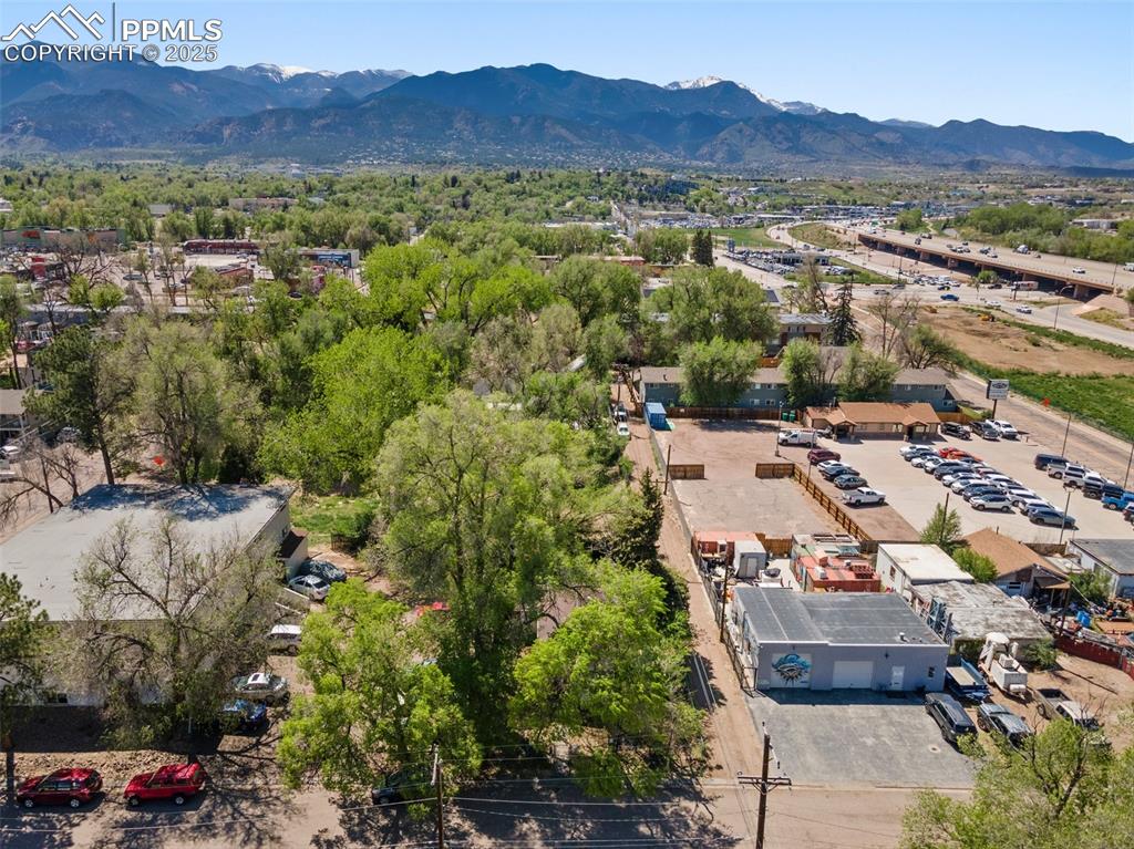 Image 24 of 31: Drone / aerial view of a mountain backdrop