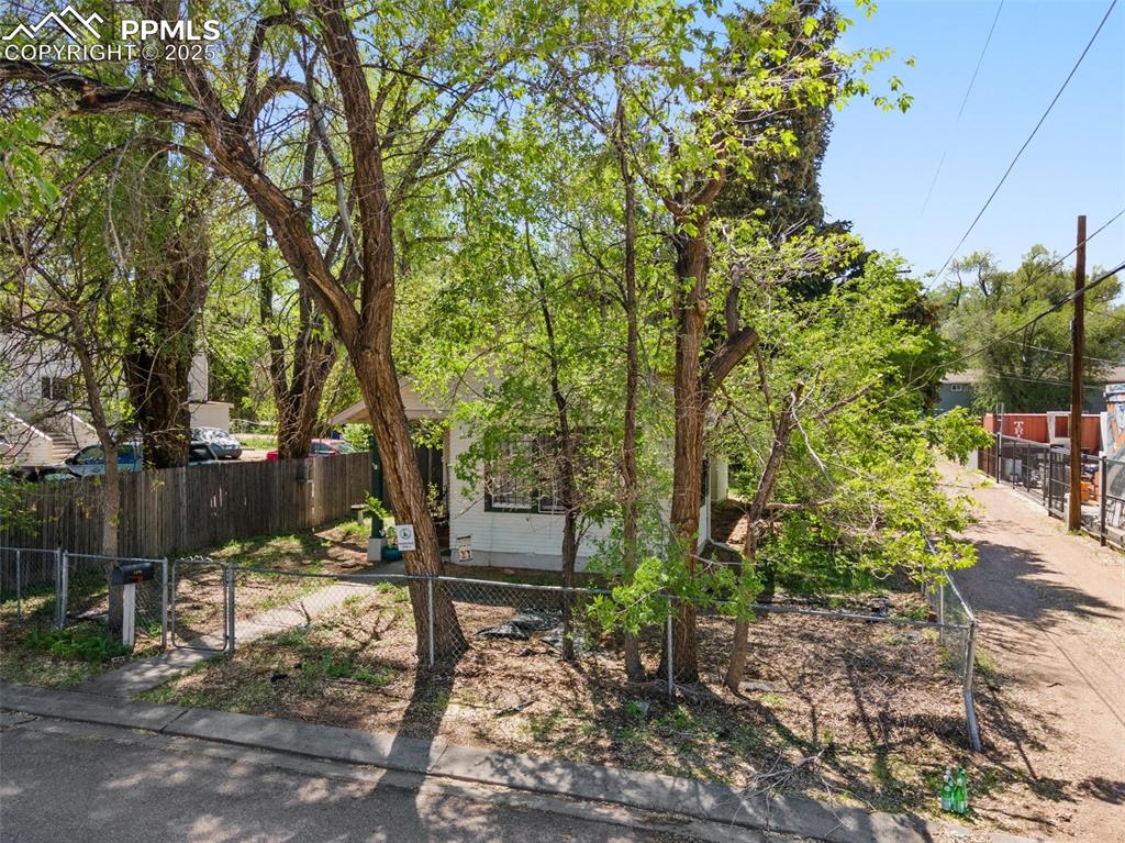 Image 30 of 31: View of fenced yard