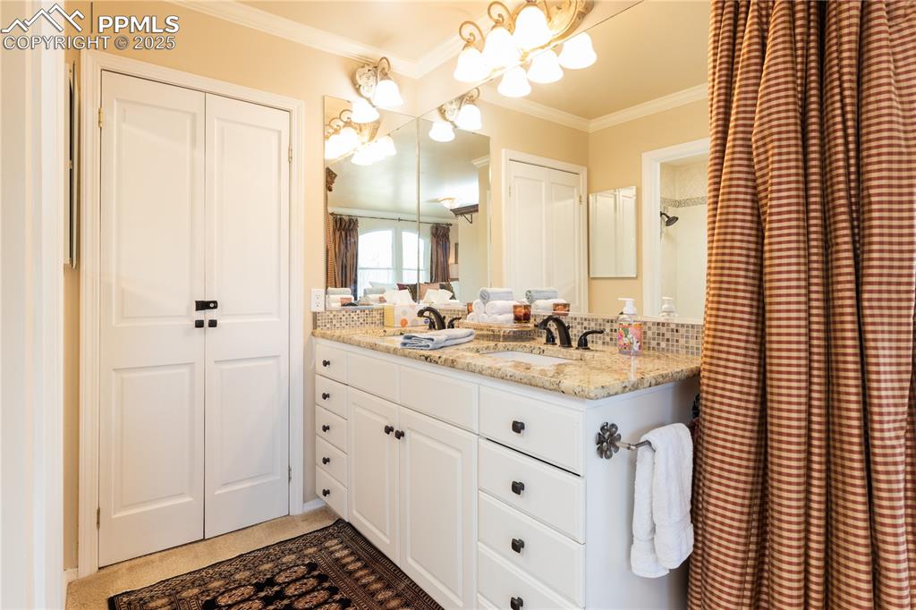 Image 13 of 49: Granite countertop dual vanity