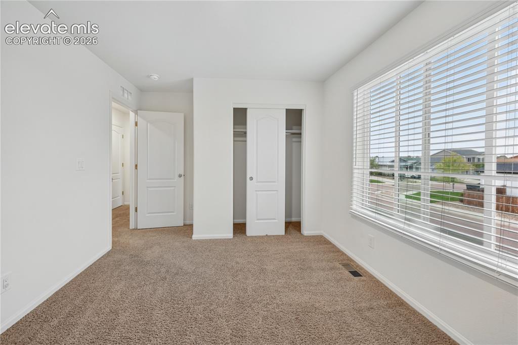 Image 19 of 26: Bedroom