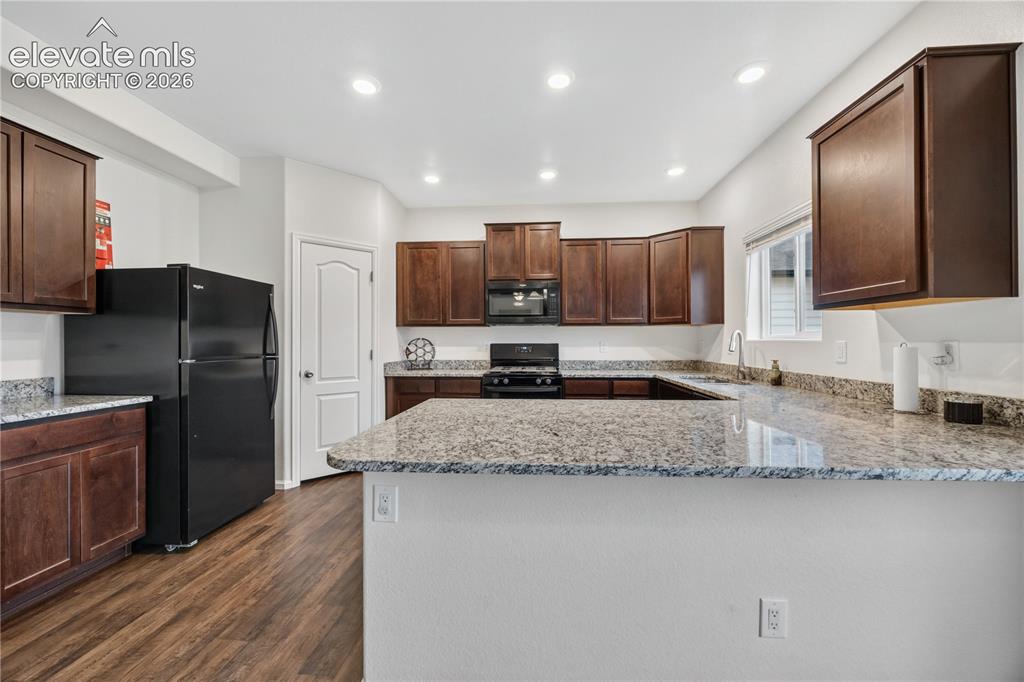 Image 7 of 26: dining and living room