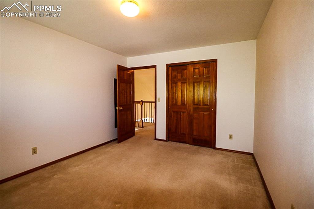 Image 22 of 38: Bedroom
