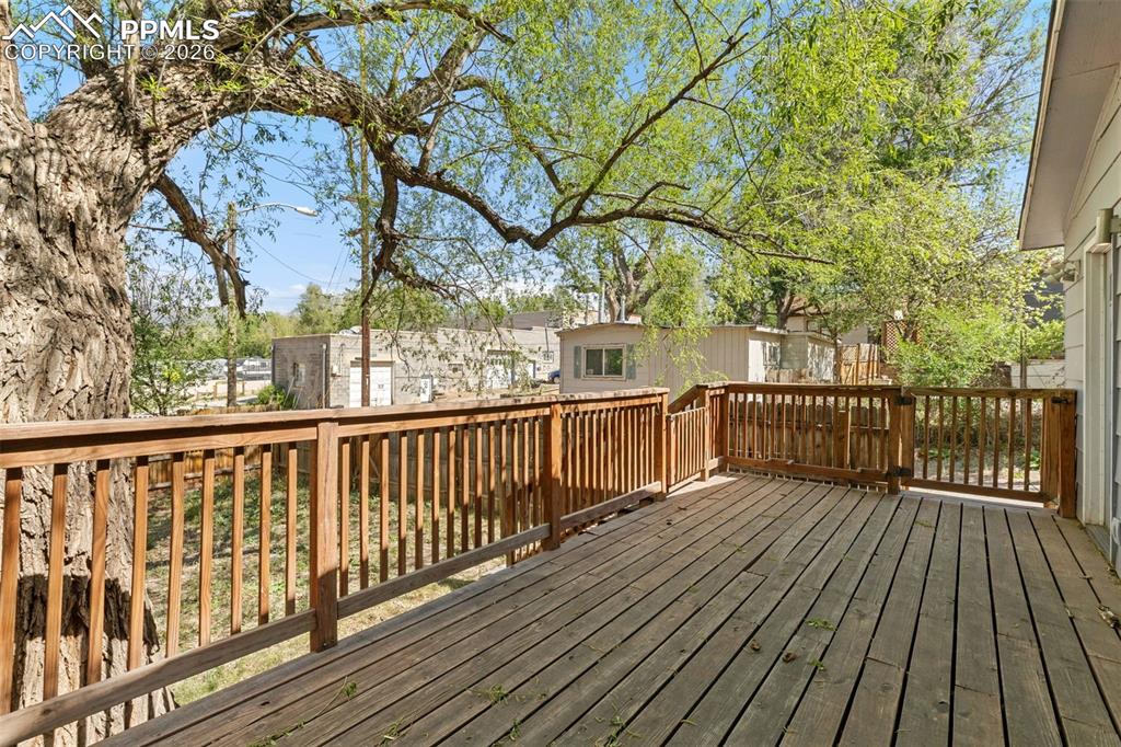 Image 23 of 35: Spacious Deck Perfect for Entertaining or Simply Enjoying the Beautiful Col