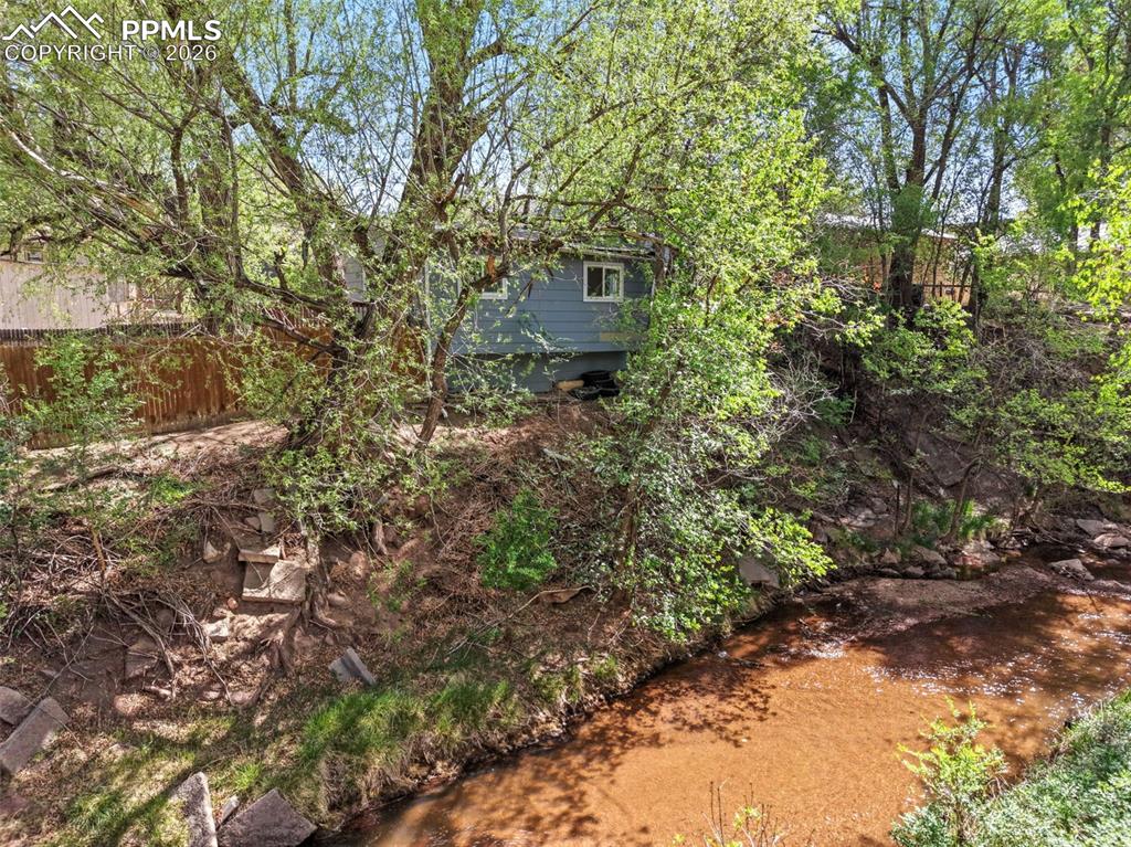 Image 28 of 35: The Home Backs up to Fountain Creek!
