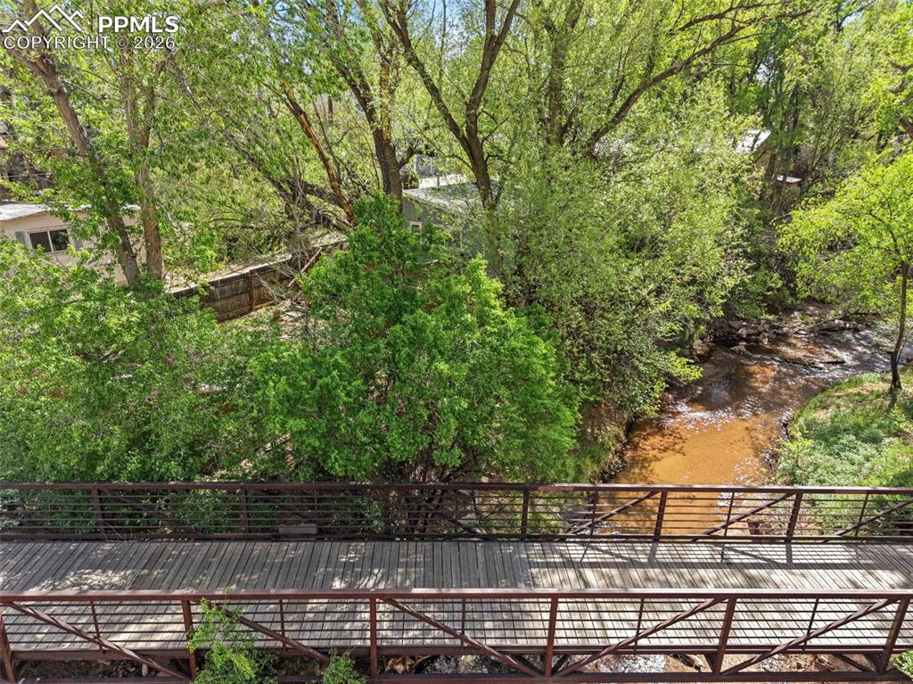 Image 30 of 35: Enjoy the Mesmerizing Flow of the Creek!