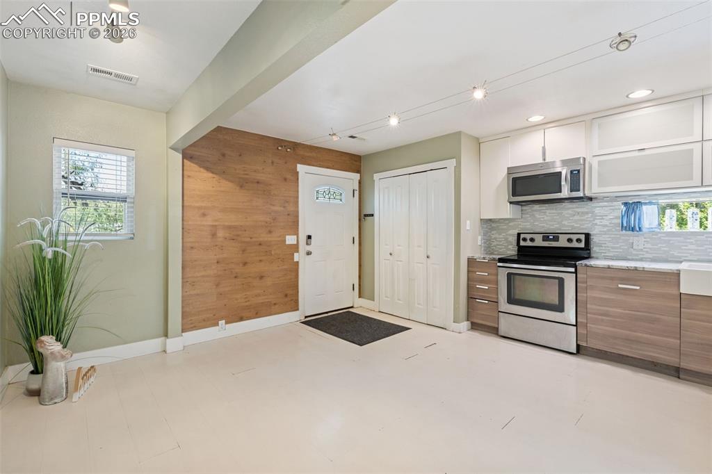 Image 4 of 35: Open Concept with Space for Living Room and Dining Area!