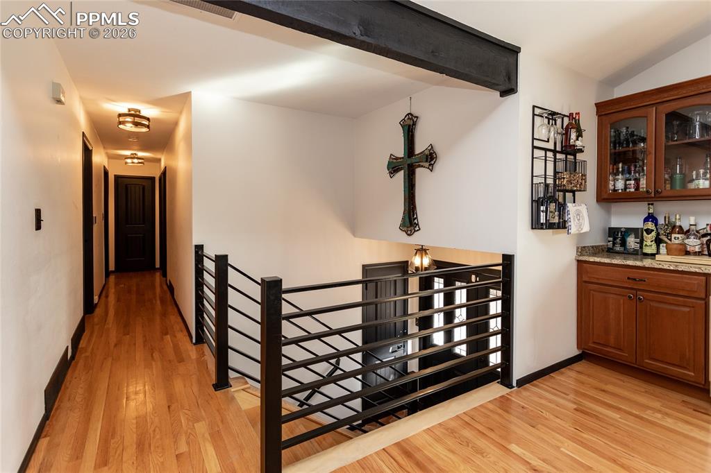 Image 11 of 50: Beautiful floors & Hallway leading to Bedrooms.