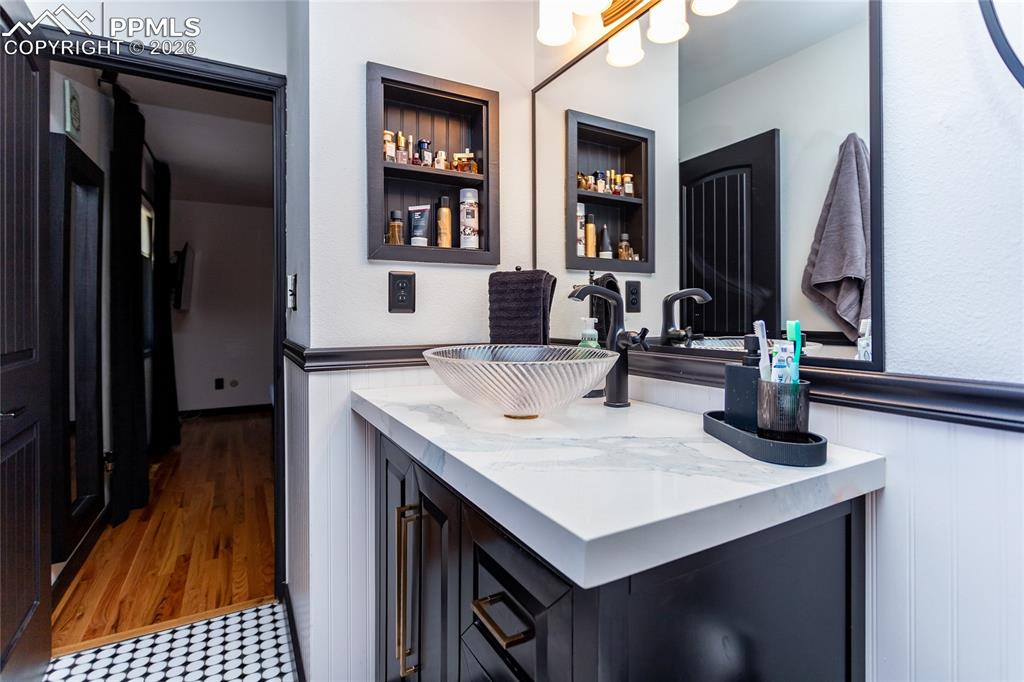 Image 37 of 50: Updated vanity with plenty of storage.