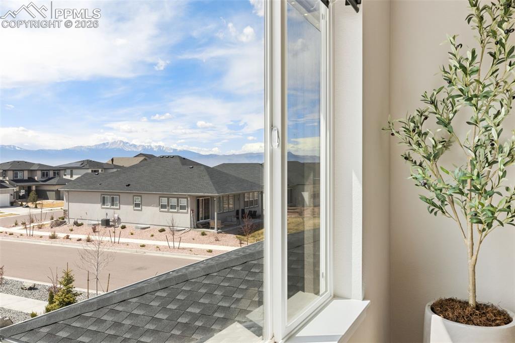 Image 27 of 47: Enjoy your Pikes Peak View from the comfort of your bed!