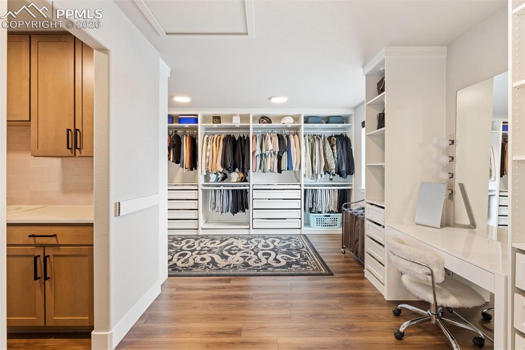 Image 30 of 47: Fabulous Primary Closet w/Convenience of attached Laundry Space