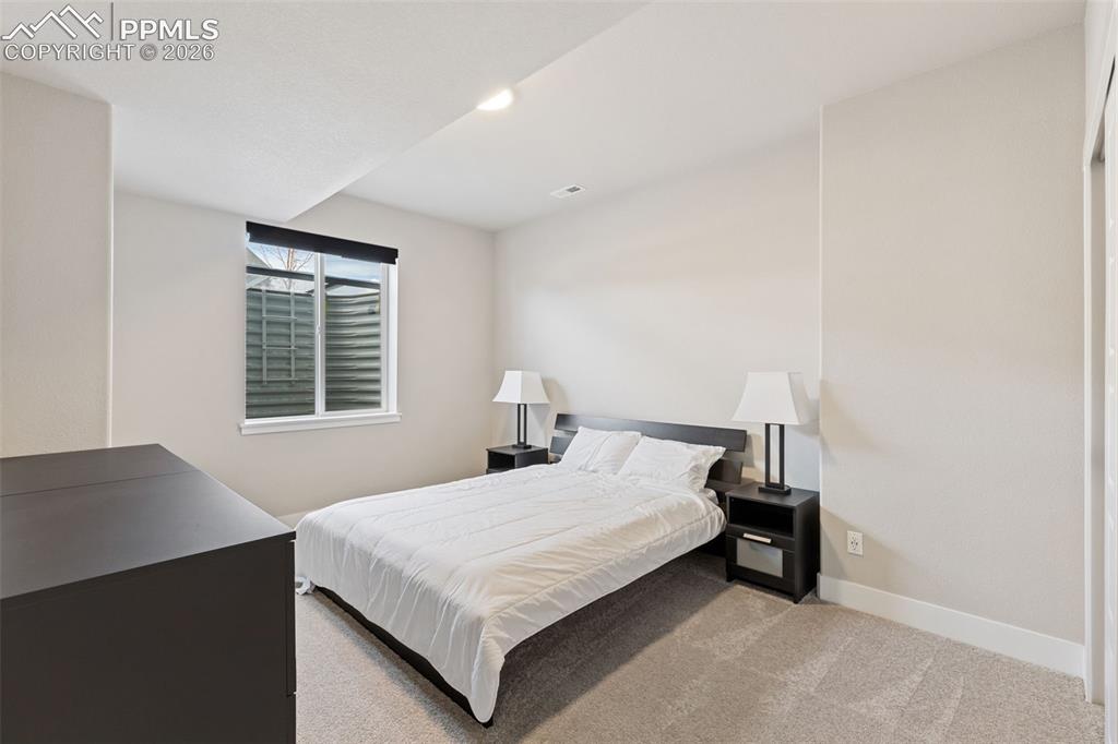 Image 38 of 47: Spacious Basement Bedroom