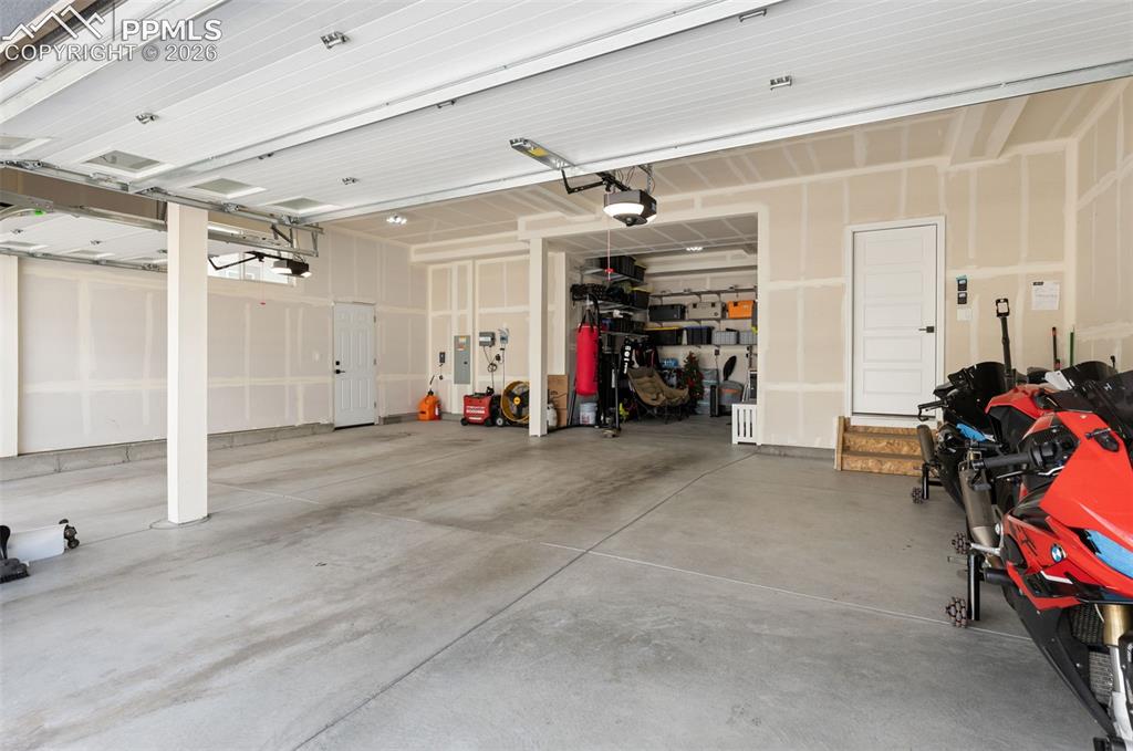 Image 40 of 47: Massive Four Car Garage w/Tandem 4th Bath